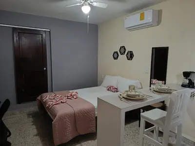 Cama o camas de una habitación en Suite 104 Cordoba Centro Estacionamiento