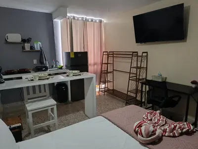 Cama o camas de una habitación en Suite 104 Cordoba Centro Estacionamiento