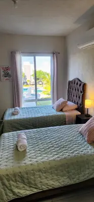 Cama o camas de una habitación en Casa Oasis Veracruzano
