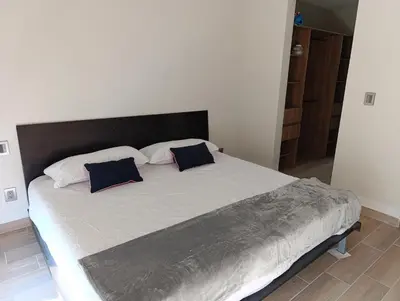 Cama o camas de una habitación en Apartamento tranquilo y familiar