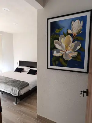 Cama o camas de una habitación en Apartamento tranquilo y familiar