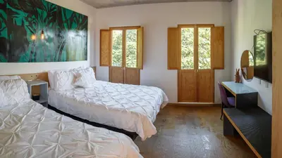 Cama o camas de una habitación en Casa Mango