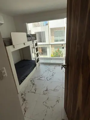 Cama o camas de una habitación en Casa a Pie de Playa