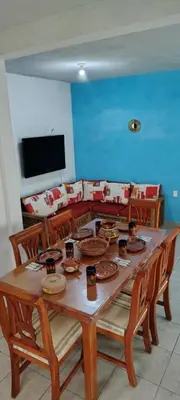 Una televisión o centro de entretenimiento en Casa Palmer, con gran jardín