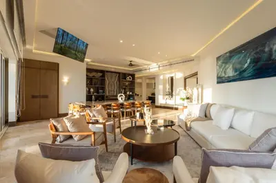 Zona de estar de Exclusive Oceanfront Apartment Beach access