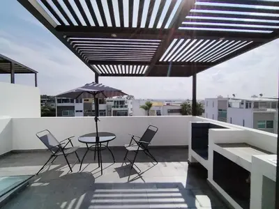 Un balcón o terraza de CASA MODERNA y SEMINUEVA EN RESIDENCIAL PRIVADO y TRANQUILO