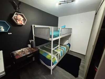 Cama o camas de una habitación en Departamento a 5 minutos del Estadio GNP