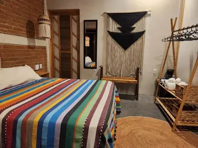 Cama o camas de una habitación en Amixtli
