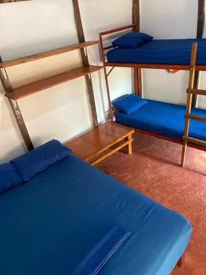 Cama o camas de una habitación en Shalom Backpacker Hostel