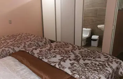 Cama o camas de una habitación en HOTEL AYOQUEZCO a