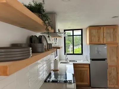 Una cocina o zona de cocina en Casa Madera 2C