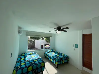 Cama o camas de una habitación en Casa Blanca