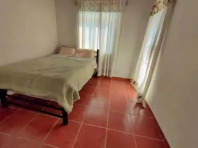 Cama o camas de una habitación en Las mejores vacaciones en Paraíso Diamante