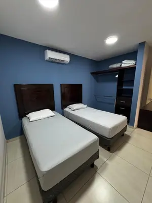 Cama o camas de una habitación en Villa Estelar Romero Bahia