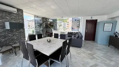 Zona de estar de Departamento con vista al mar y campo de Golf