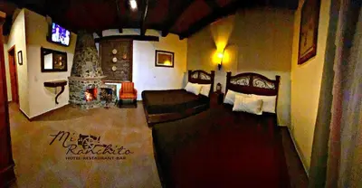 Cama o camas de una habitación en Mi Ranchito Chignahuapan Hotel