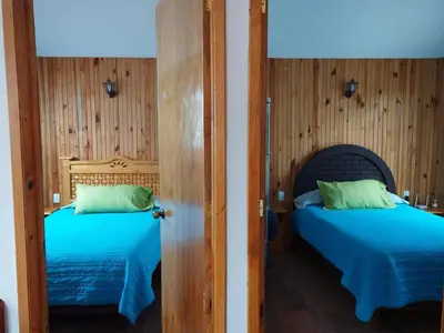 Cama o camas de una habitación en Cabañas Chely