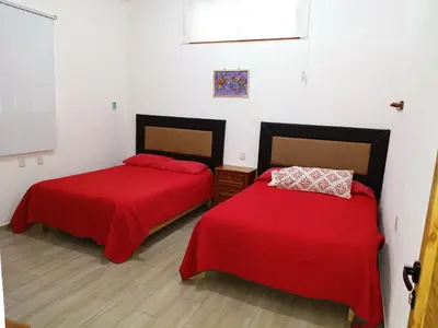 Cama o camas de una habitación en Cabañas Chely