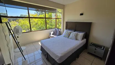 Cama o camas de una habitación en Departamento acogedor