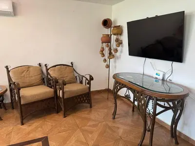 Una televisión o centro de entretenimiento en Un rincón cerca del sol