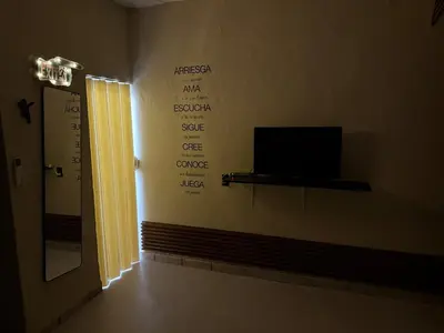 Una televisión o centro de entretenimiento en Mini Departmento
