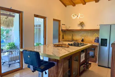 Una cocina o zona de cocina en Nour Huatulco
