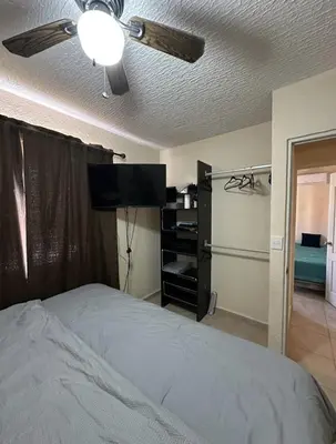 Cama o camas de una habitación en Departamento en Zona Diamante Acapulco