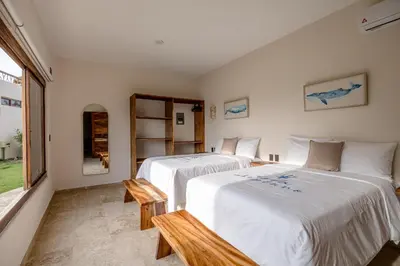 Cama o camas de una habitación en Isla Neptuno
