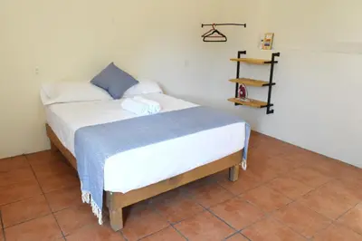 Cama o camas de una habitación en Casa Macuil Punta Zicatela