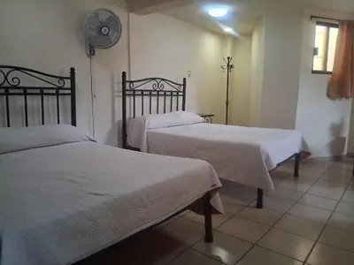 Cama o camas de una habitación en Hotel Antigua Encomienda