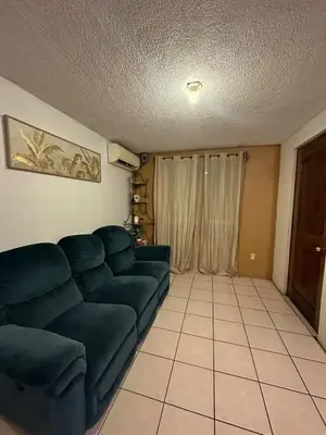 Zona de estar de Departamento Céntrico en Huatulco climatizado
