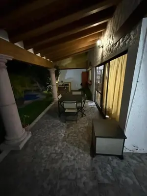 Zona de estar de Casa La Cañada216 con Alberca Climatizada
