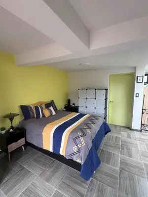 Cama o camas de una habitación en Loft con terraza privada en CDMX