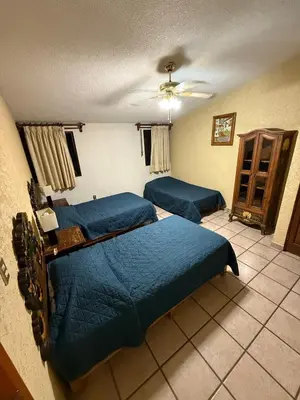 Cama o camas de una habitación en La Cañada216 Con Alberca Climatizada