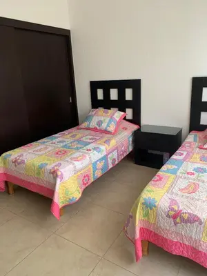 Cama o camas de una habitación en Depa within Paraiso Country Club Golf Club