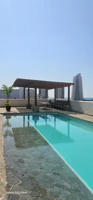 Piscina en o cerca de Padrísimo depto frente al mar
