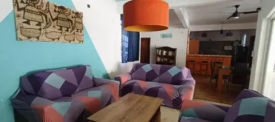Zona de estar de Beach-style house near the sea