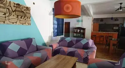 Zona de estar de Beach-style house near the sea