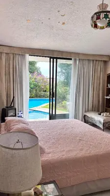 Cama o camas de una habitación en casa en cuernavaca