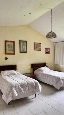 Cama o camas de una habitación en casa en cuernavaca