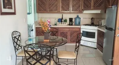 Una cocina o zona de cocina en Bahias de Huatulco Condo