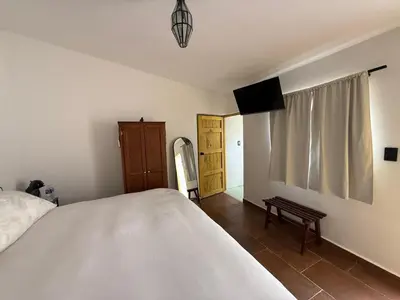 Cama o camas de una habitación en Casita de pueblo, Cercana a los Volcanes