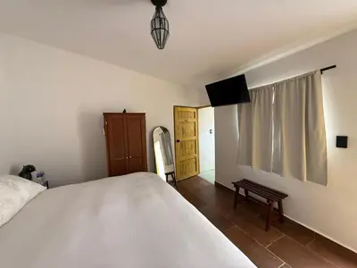 Cama o camas de una habitación en Casita de pueblo, Cercana a los Volcanes