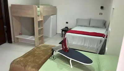 Cama o camas de una habitación en Habitación Chero Premiun