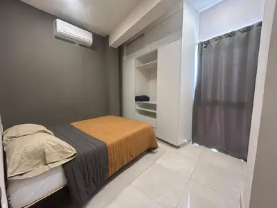 Cama o camas de una habitación en Departamentos frente a Chedraui