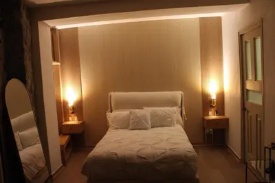 Cama o camas de una habitación en Loft de ensueño en el corazón de Val'Quirico