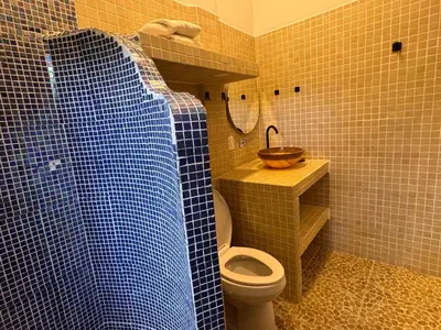 Un baño de Garden-Ocean view Casa Xochi