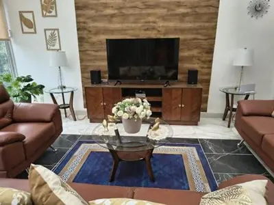Zona de estar de Casa Marcy, casa nueva con alberca y tres recamaras