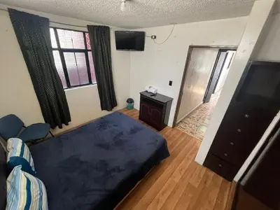 Cama o camas de una habitación en Alas Host