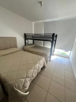 Cama o camas de una habitación en Acapulco Caracol Diamante